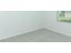 Bright bedroom featuring neutral carpet and a window with blinds at 5153 Forget Me Not Ave, Lake Hamilton, FL 33851