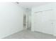 Cozy bedroom with carpet and a closet with sliding doors at 5153 Forget Me Not Ave, Lake Hamilton, FL 33851