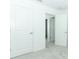 Clean, white interior with multiple doorways suggesting an open layout and easy access throughout the home at 5153 Forget Me Not Ave, Lake Hamilton, FL 33851