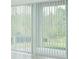 Bright living room featuring windows with blinds at 5153 Forget Me Not Ave, Lake Hamilton, FL 33851