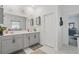 Bright bathroom featuring double sinks and contemporary finishes at 588 Hitch Loop, St Cloud, FL 34769