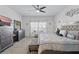 Serene bedroom with neutral tones, a cozy bed, and ample closet space at 588 Hitch Loop, St Cloud, FL 34769