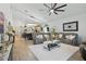 Spacious living room with dining and kitchen views, perfect for entertaining at 588 Hitch Loop, St Cloud, FL 34769