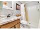 Bathroom features modern sink, shower, and neutral decor at 6375 Topsy Trl, St Cloud, FL 34771