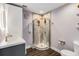 Modern bathroom with stylish vanity, glass-enclosed shower, and updated fixtures at 6375 Topsy Trl, St Cloud, FL 34771