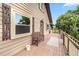 Relaxing covered deck featuring outdoor seating, smooth wood floors, and scenic views at 6375 Topsy Trl, St Cloud, FL 34771