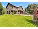 Spacious house with lush lawn and convenient lower-level access and exterior stairs at 6375 Topsy Trl, St Cloud, FL 34771