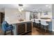 Spacious open floor plan with stone countertops, recessed lights and wine fridge at 6375 Topsy Trl, St Cloud, FL 34771