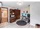 Home office with desk, computer monitors, and shelving, perfect for remote work at 6375 Topsy Trl, St Cloud, FL 34771
