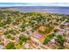 Aerial view of community with homes and neighborhood amenities including community park and playground at 712 Maryland Ave, St Cloud, FL 34769