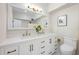Bathroom showcasing double vanity and modern finishes at 712 Maryland Ave, St Cloud, FL 34769