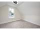 Neutral bedroom featuring plush carpet and window at 712 Maryland Ave, St Cloud, FL 34769