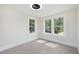 Cozy bedroom featuring windows providing ample natural light at 712 Maryland Ave, St Cloud, FL 34769