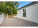 Inviting outdoor deck provides ample space with a clean, modern design and access to the backyard at 712 Maryland Ave, St Cloud, FL 34769