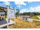 Sign at Godwin Park featuring tennis courts and a bicycle rack at 712 Maryland Ave, St Cloud, FL 34769