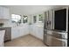 Bright kitchen with stainless steel appliances and sleek, modern cabinetry at 712 Maryland Ave, St Cloud, FL 34769