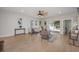 Spacious living room filled with natural light, showcasing stylish furniture and a soothing color palette at 712 Maryland Ave, St Cloud, FL 34769