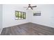 Bedroom featuring sleek wood floors, a ceiling fan and natural light at 713 Coach Light Dr, Fern Park, FL 32730