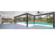 Enclosed patio area with a sparkling pool and mature trees in the backyard at 713 Coach Light Dr, Fern Park, FL 32730