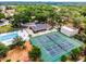 Aerial photo displays the neighborhood tennis courts, playground, and pool at 717 Pine Ter, Altamonte Springs, FL 32714