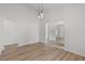 Open dining area with modern light fixtures and light-colored wood-look flooring at 717 Pine Ter, Altamonte Springs, FL 32714