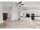 Open concept living room with views into kitchen and entry door at 717 Pine Ter, Altamonte Springs, FL 32714