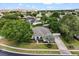 Charming single-story home with lush landscaping, mature trees, and a well-manicured lawn at 7978 Sea Pearl Cir, Kissimmee, FL 34747