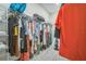 Walk-in closet with an abundance of shelving for storage, and clothing hanging at 8907 Fallen Oak, Davenport, FL 33897