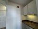 View of a built-in work station with cabinets and drawers adjacent to the front door at 911 N Orange Ave # 545, Orlando, FL 32801
