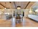 Dining room features a wood dining table and light wood flooring at 940 Lincoln Cir, Winter Park, FL 32789