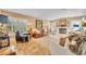Cozy living room with lots of seating, a fireplace, and lots of natural light at 940 Lincoln Cir, Winter Park, FL 32789