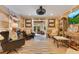 Comfortable living room featuring unique decor, natural accents, and a cozy layout at 940 Lincoln Cir, Winter Park, FL 32789