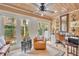 Bright office space with natural light, charming decor, and views of the lush garden at 940 Lincoln Cir, Winter Park, FL 32789