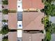 Aerial view of home showcasing tile roof, screened in patio, and well-maintained landscaping at 11918 Nautica Dr, Orlando, FL 32827