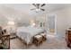 Well-lit bedroom with a king-sized bed, ceiling fan, and large windows, creating a comfortable and inviting space at 11918 Nautica Dr, Orlando, FL 32827