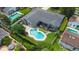 Stunning aerial view of backyard pool, patio, and lush landscaping of this well-maintained property at 1245 Munster St, Orlando, FL 32803