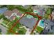 Magnificent aerial view highlighting the property's layout, backyard pool, and lush surrounding landscape at 1245 Munster St, Orlando, FL 32803
