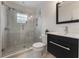Modern bathroom with a glass-enclosed shower, mosaic tile, and stylish vanity offering a spa-like experience at 1245 Munster St, Orlando, FL 32803