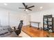 Functional home office space with hardwood floors, neutral decor, and plenty of room for organization and productivity at 1245 Munster St, Orlando, FL 32803
