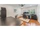 Bright home office with natural light, hardwood floors, and ample space for a productive work environment at 1245 Munster St, Orlando, FL 32803