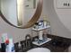 Close-up of bathroom sink with a decorative mirror and modern fixtures at 1364 Gainesville Dr, Deltona, FL 32725