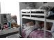 Image of the bedroom featuring a bunk bed, vanity, and bright window at 1364 Gainesville Dr, Deltona, FL 32725