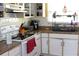 Functional kitchen featuring white appliances, ample counter space, and practical storage solutions at 1364 Gainesville Dr, Deltona, FL 32725