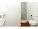 This bathroom features tiled floors, a shower, and standard toilet at 1405 Paula Dr, Apopka, FL 32703