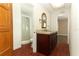 Bathroom with stylish vanity, tiled floors, and shower with glass door at 1405 Paula Dr, Apopka, FL 32703