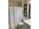 Standard bathroom with shower-tub, vanity with cabinets, toilet, and neutral wall color at 1585 Stefan Cole Ln, Apopka, FL 32703