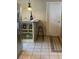 Bright kitchen featuring stainless steel appliances, granite countertops, a breakfast bar, and tiled floors at 1585 Stefan Cole Ln, Apopka, FL 32703