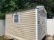 Exterior view of a clean, well-maintained shed in the backyard at 1585 Stefan Cole Ln, Apopka, FL 32703
