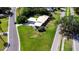 Aerial view showcasing the landscaped yard, home layout, and neighborhood surroundings at 2001 Lily Ct, Sanford, FL 32771