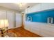 Cozy bedroom with storage, natural light, and a view into an adjoined seating area at 2001 Lily Ct, Sanford, FL 32771